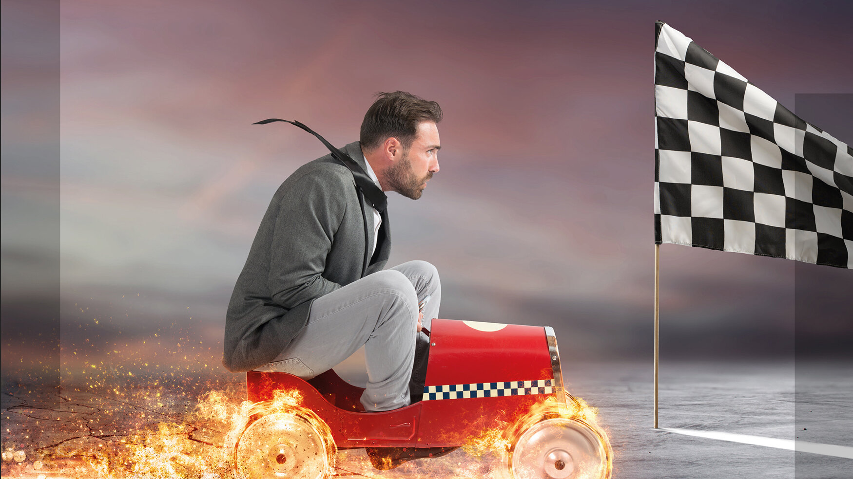 Programmflyer des ift-Brandschutzforum mit Foto eines Mannes auf einem kleinen Auto mit brennenden Reifen auf der Ziellinie
